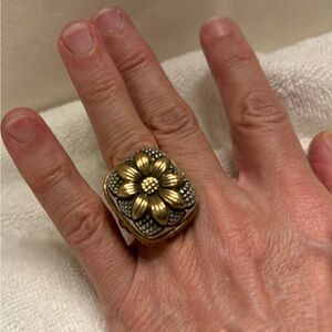 Stephen Dweck Sterling silver flower cushion statement ring with brass accent.